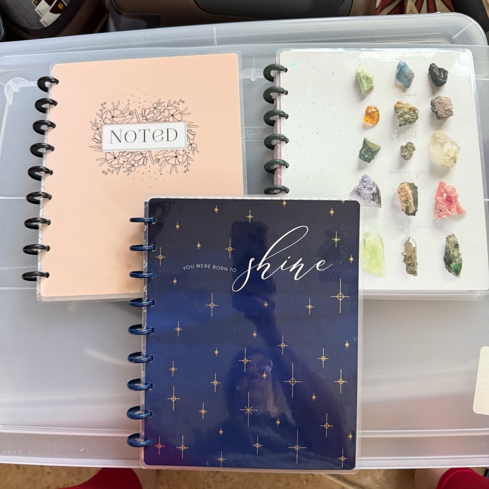Multiple Happy Planner book covers & paper enclosed